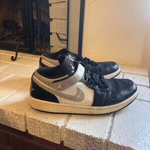 Jordan Men’s Black and White Low Top Sneakers